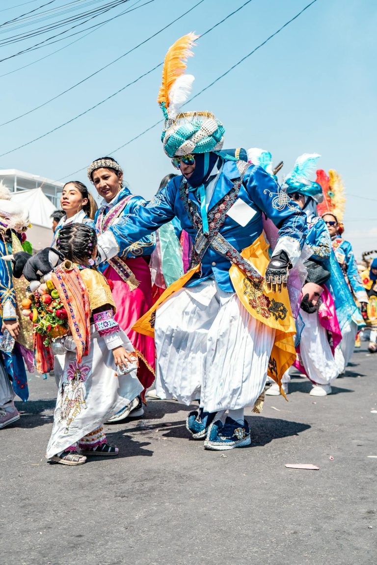 Colorful traditional costumes in a lively parade festival.